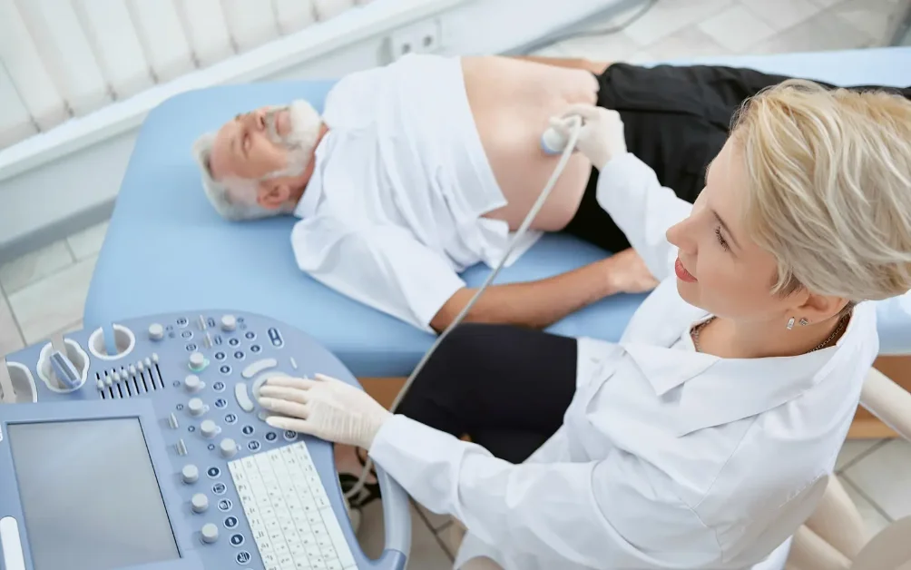 A clinician running an ultrasound screening